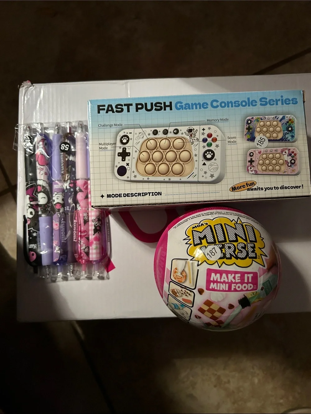 White Handheld Game Console Series with Pop Buttons